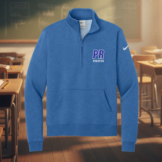 A heather blue Nike quarter-zip pullover sweatshirt with a white swoosh on the left sleeve and 'PB PIRATES' printed in purple and white on the left chest, shown on a plain white background.